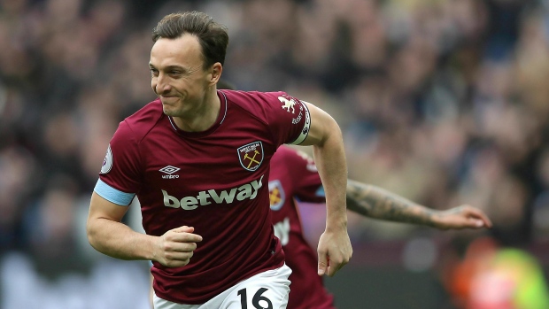 Mark Noble celebrates, The Canadian Press Mark Noble celebrates