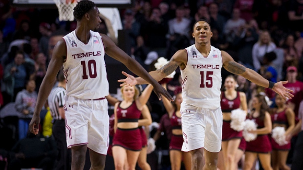 Shizz Alston Jr. (10) and Nate Pierre-Louis (15)