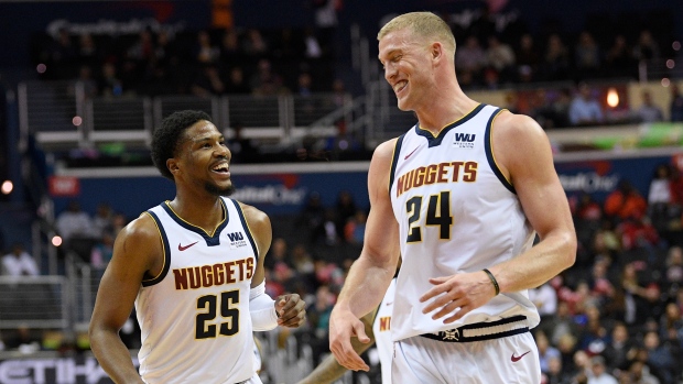 Malik Beasley and Mason Plumlee, The Canadian Press Malik Beasley and Mason Plumlee