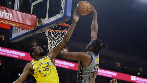 Kevin Durant and Myles Turner, The Canadian Press Kevin Durant and Myles Turner