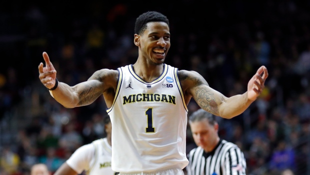 Michigan guard Charles Matthews, The Canadian Press Michigan guard Charles Matthews
