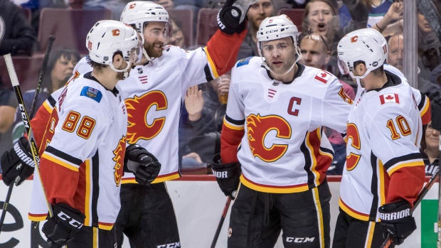 Mark Giordano and teammates celebrate , The Canadian Press Mark Giordano and teammates celebrate