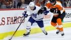 Leafs forward Tyler Ennis battles Flyers' Corban Knight on Wednesday.