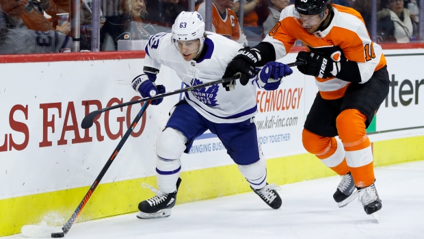 Leafs forward Tyler Ennis battles Flyers' Corban Knight on Wednesday., The Canadian Press Leafs forward Tyler Ennis battles Flyers' Corban Knight on Wednesday.