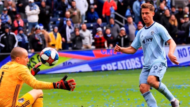 Kriztian Nemeth scores on Evan Bush, The Canadian Press Kriztian Nemeth scores on Evan Bush