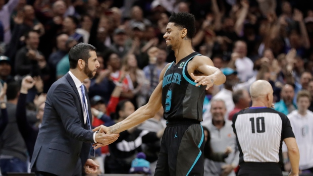 Jeremy Lamb (3) is congratulated by coach James Borrego