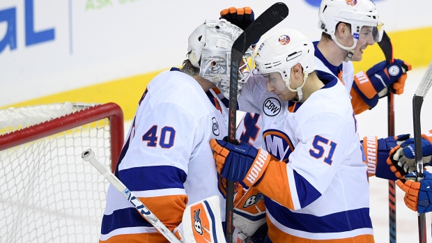 Islanders players celebrate