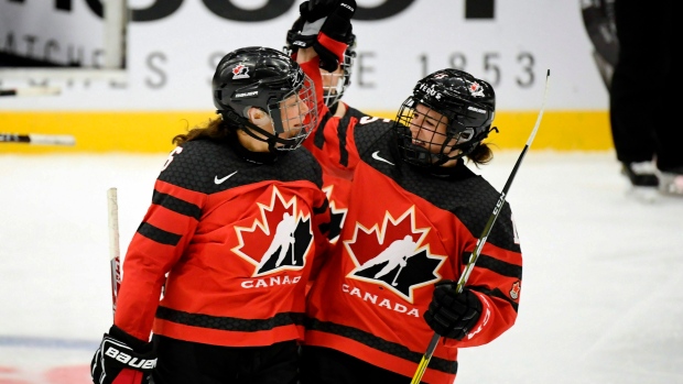 Team Canada celebrates, The Canadian Press Team Canada celebrates