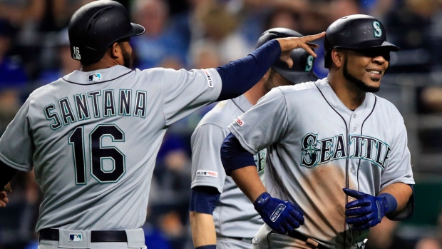 Domingo Santana Edwin Encarnacion, The Canadian Press Domingo Santana Edwin Encarnacion