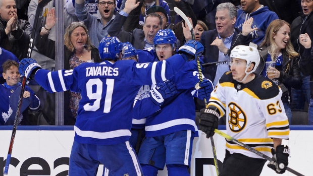 Auston Matthews and John Tavares celebrate 