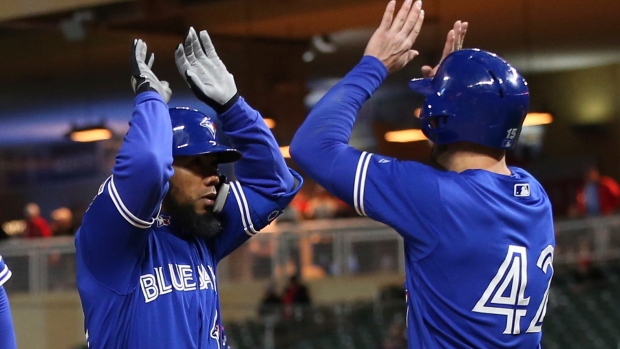 Teoscar Hernandez and Justin Smoak, The Canadian Press Teoscar Hernandez and Justin Smoak