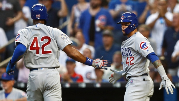 Chicago Cubs celebrate , The Canadian Press Chicago Cubs celebrate