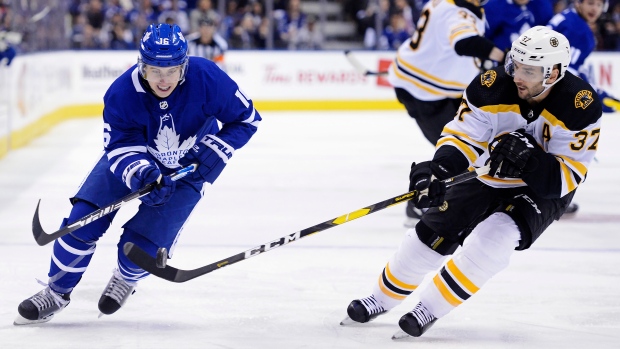 Mitch Marner and Patrice Bergeron, The Canadian Press Mitch Marner and Patrice Bergeron