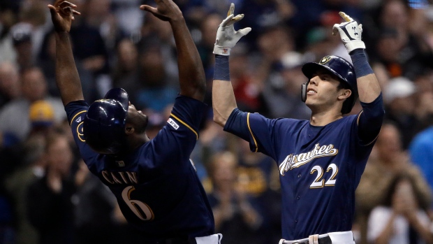 Christian Yelich, Lorenzo Cain, The Canadian Press Christian Yelich, Lorenzo Cain