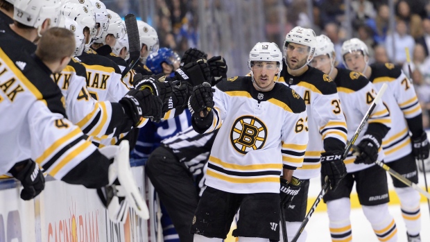Brad Marchand celebrates his goal against the Leafs on Wednesday.