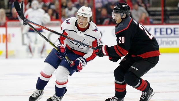 Sebastian Aho and T.J. Oshie, The Canadian Press Sebastian Aho and T.J. Oshie