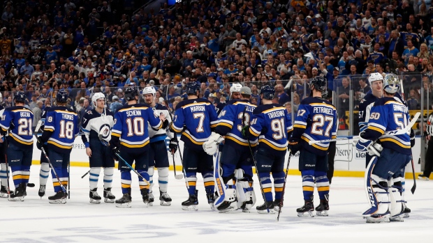 St. Louis Blues Winnipeg Jets shake hands, The Canadian Press St. Louis Blues Winnipeg Jets shake hands