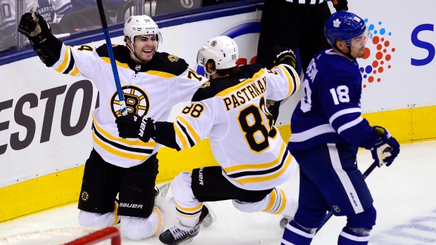 DeBrusk, Pastrnak celebrate, The Canadian Press DeBrusk, Pastrnak celebrate