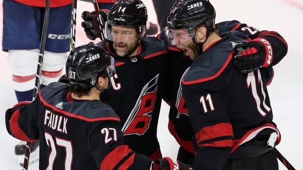 Jordan Staal, Hurricanes players celebrate, The Canadian Press Jordan Staal, Hurricanes players celebrate