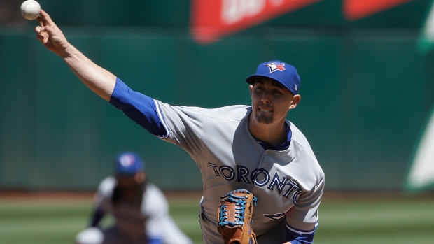 Aaron Sanchez pitches against the Athletics.