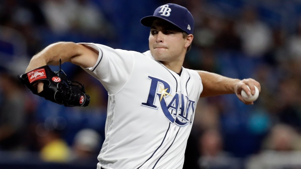 Beeks comes in, pitches Rays over sliding Royals 