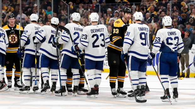Boston Bruins and Toronto Maple Leafs shake hands