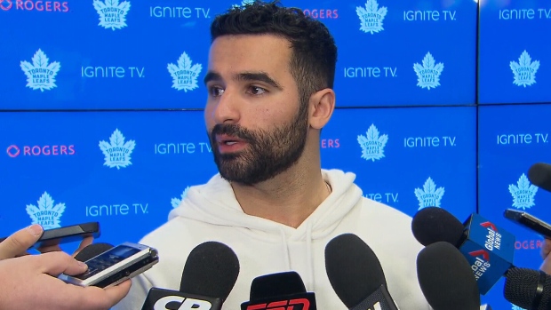 Nazem Kadri talks to reporters