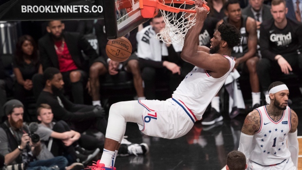 Joel Embiid dunks against Brooklyn in Round 1.