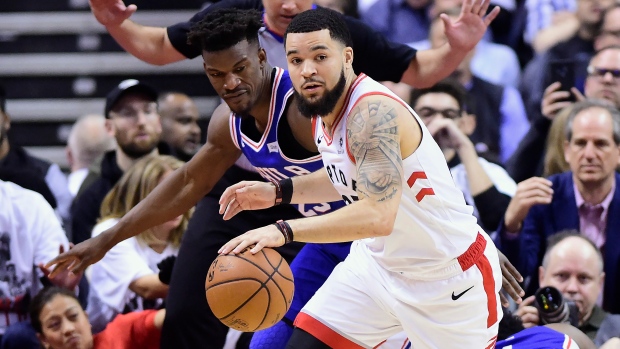 Fred VanVleet tries to fend off Jimmy Butler Monday night.