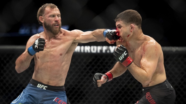 Donald Cerrone and Al Iaquinta, The Canadian Press Donald Cerrone and Al Iaquinta