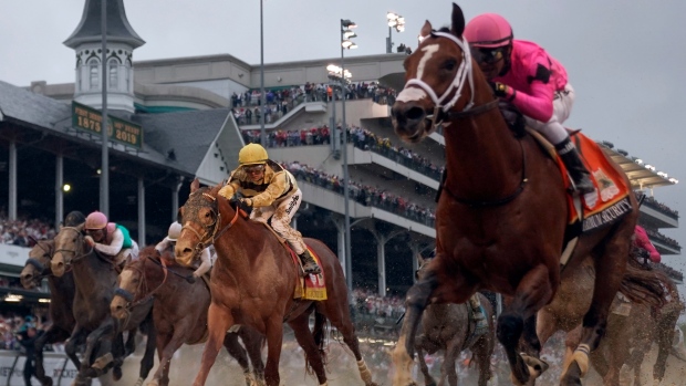 Maximum Security (right) and Country House, The Canadian Press Maximum Security (right) and Country House