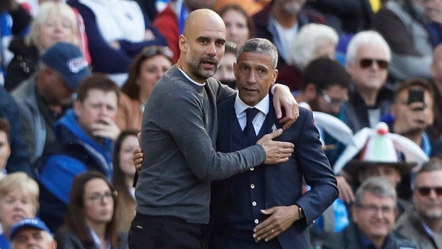Pep Guardiola and Brighton manager Chris Hughton, The Canadian Press Pep Guardiola and Brighton manager Chris Hughton