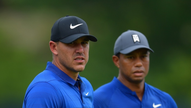 Brooks Koepka and Tiger Woods