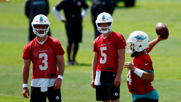 Josh Rosen, Jake Rudock and Ryan Fitzpatrick , The Canadian Press Josh Rosen, Jake Rudock and Ryan Fitzpatrick