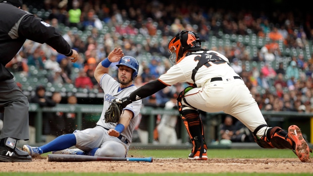 Aramis Garcia tags out Randal Grichuk