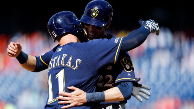 Mike Moustakas Christian Yelich, The Canadian Press Mike Moustakas Christian Yelich