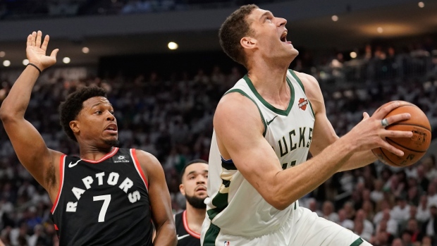 Brook Lopez shoots past Kyle Lowry during Game 1.