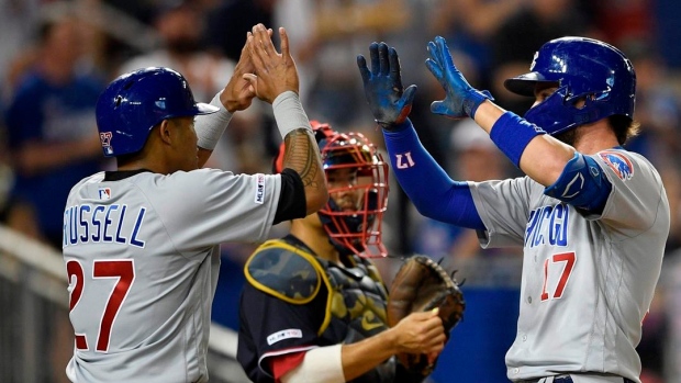 Kris Bryant and Addison Russell  celebrate 