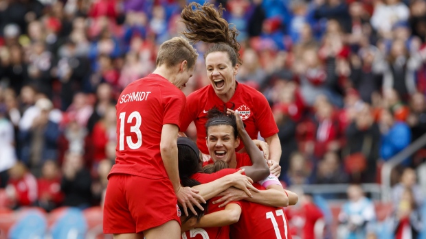 Christine Sinclair and Team Canada Celebrate, The Canadian Press Christine Sinclair and Team Canada Celebrate