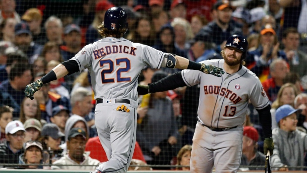 Josh Reddick Tyler White, The Canadian Press Josh Reddick Tyler White