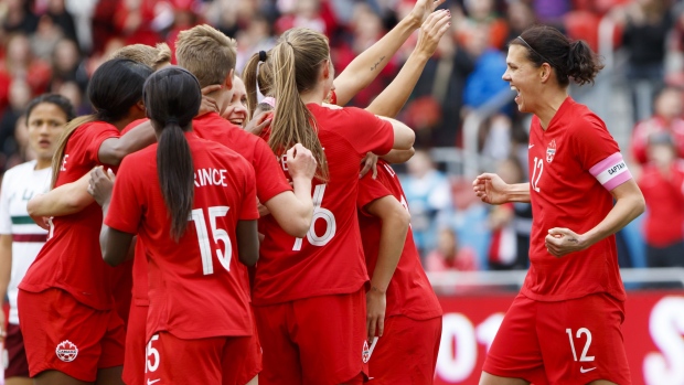 Christine Sinclair Team Canada Celebrates, The Canadian Press Christine Sinclair Team Canada Celebrates