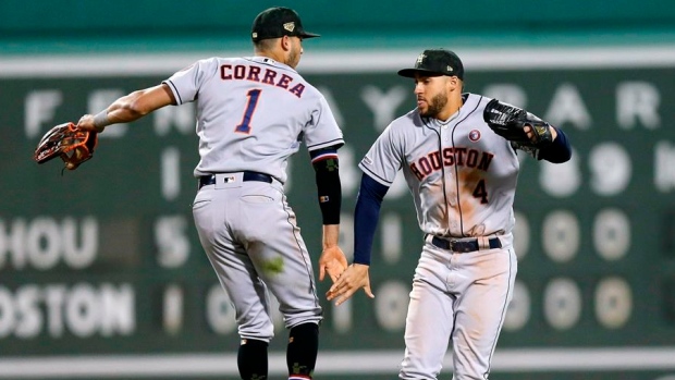 Carlos Correa George Springer, The Canadian Press Carlos Correa George Springer