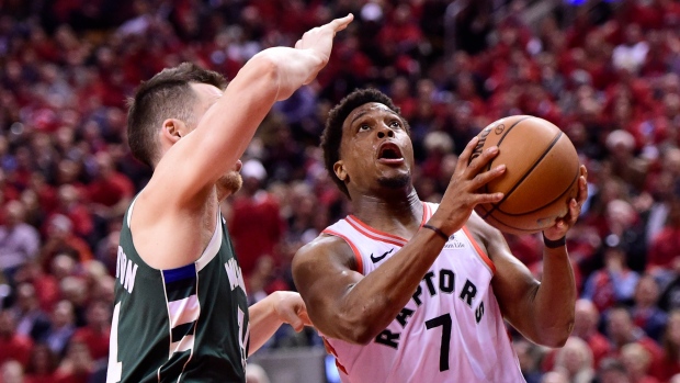 Kyle Lowry and Pat Connaughton , The Canadian Press Kyle Lowry and Pat Connaughton