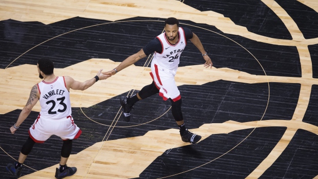 Norm Powell and Fred VanVleet, The Canadian Press Norm Powell and Fred VanVleet