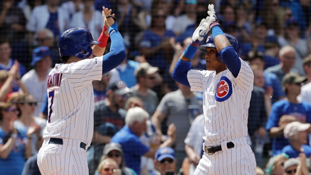 Addison Russell Celebrates Homer, The Canadian Press Addison Russell Celebrates Homer