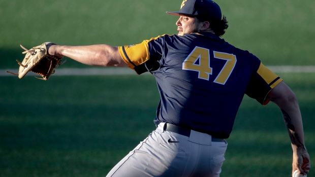 Alek Manoah pitches during an NCAA game in April., The Canadian Press Alek Manoah pitches during an NCAA game in April.