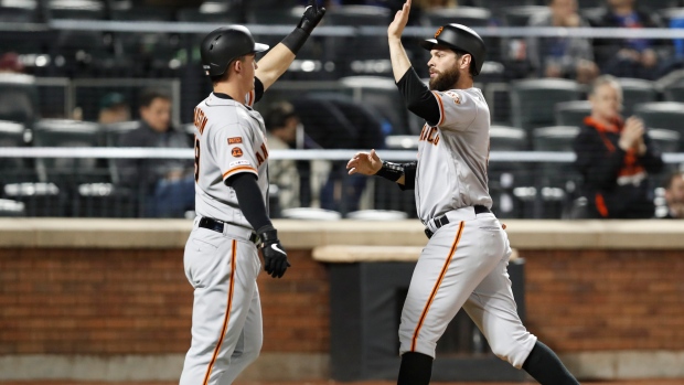Tyler Austin, Brandon Belt , The Canadian Press Tyler Austin, Brandon Belt