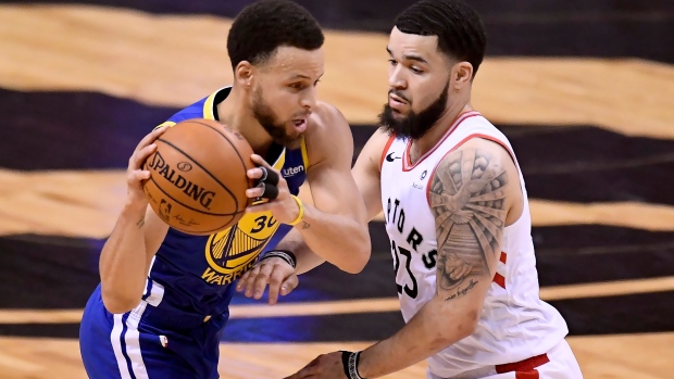 Fred VanVleet defends against Steph Curry.