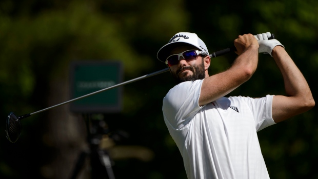Adam Hadwin tees off on the 15th hole on Friday.
