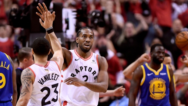 Kawhi Leonard, Fred VanVleet and Draymond Green 